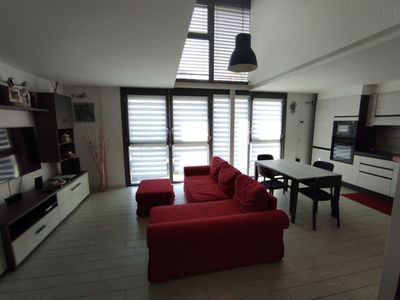 Modern bunk bed bedroom with balcony in a 3-bedroom apartment in Forlanini Milan